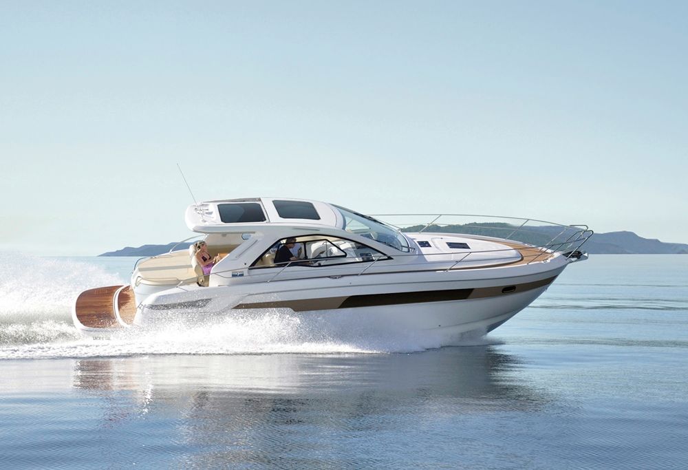 Bavaria 39 boat sailing through the turquoise waters of Ibiza, available for hire with skipper